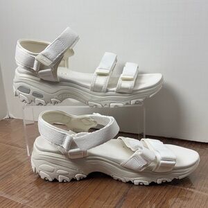 Sketchers, White Women's Sandals with Velcro closures. Size 9.